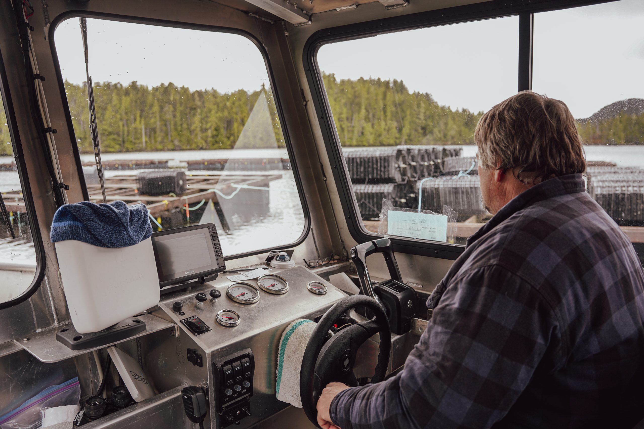 boat captain driving a boat